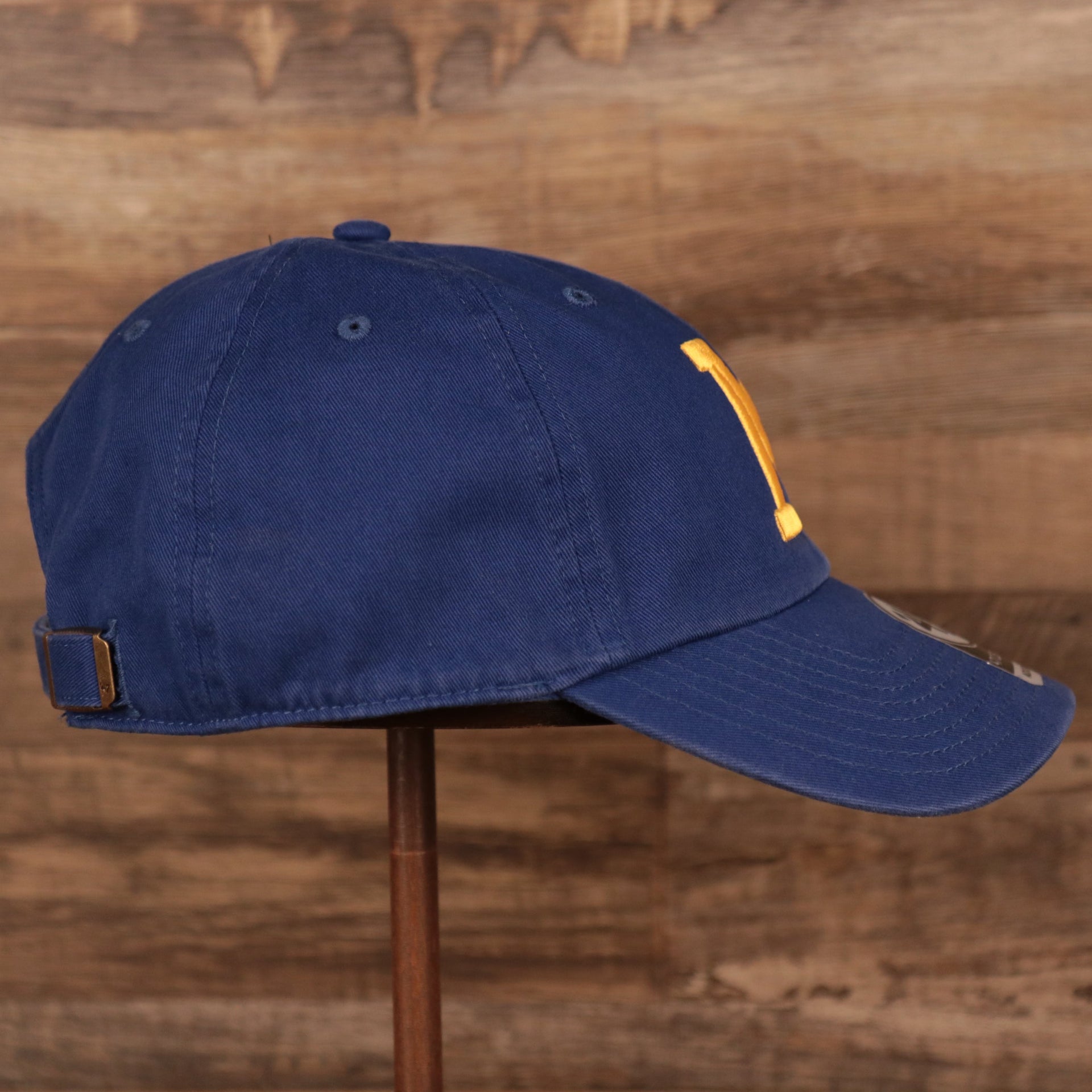 wearers right side of the Milwaukee Brewers Throwback Blue Adjustable Dad Hat