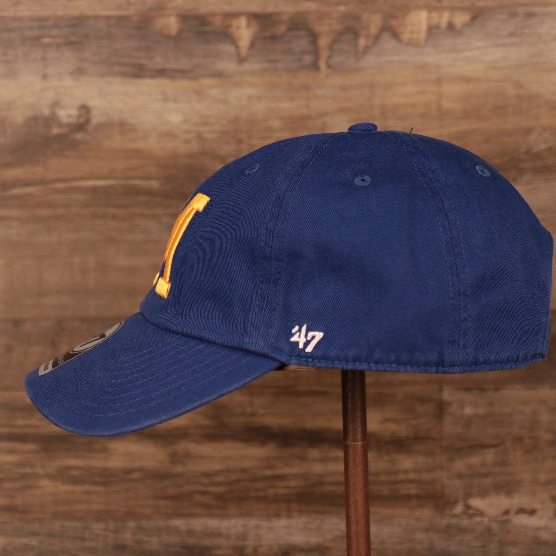 wearers left side of the Milwaukee Brewers Throwback Blue Adjustable Dad Hat