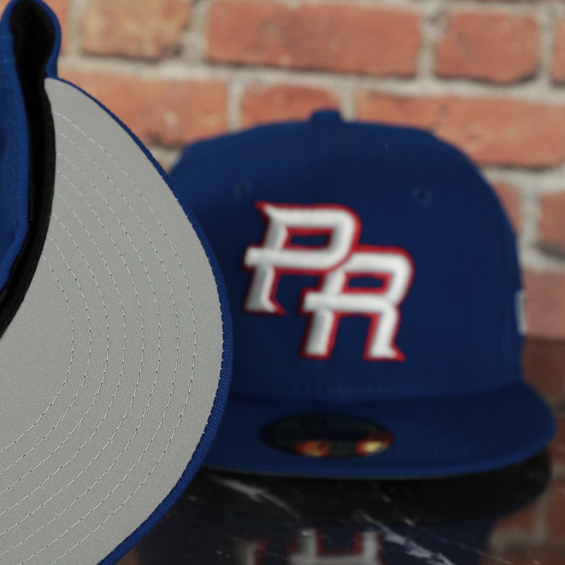 grey under visor on the Puerto Rico 2023 World Baseball Classic Grey Bottom Blue 59Fifty Fitted Cap
