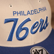 logo shot of the Philadelphia 76ers Script Font Gray Adjustable Green Bottom Snapback