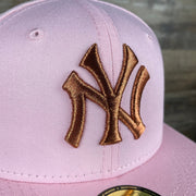 Close up of the New York Yankees logo on the New York Yankees 1949 World Series Sky Blue Bottom Side Patch 59Fifty Fitted Cap | Valentine’s Day Pack
