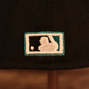 Close up of the Cooperstown batterman logo  on the back of the Florida Marlins Cooperstown "City Cluster" Side Patch Gray Bottom Black 59Fifty Fitted Cap