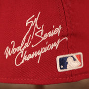Close up of the 5X World Series Champions script on the back of the Cincinnati Reds All Over World Series Side Patch 5x Champ Gray Bottom 59Fifty Fitted Cap