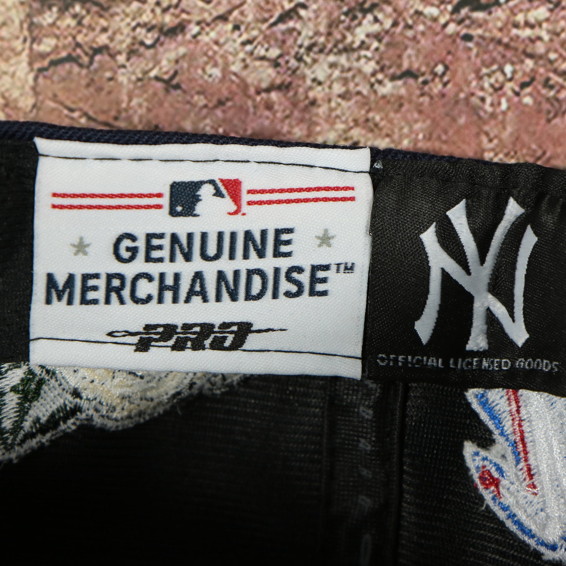 official licensed label on the New York Yankees All Over Roses Patch Grey Bottom | Midnight Navy Wool Snapback Hat