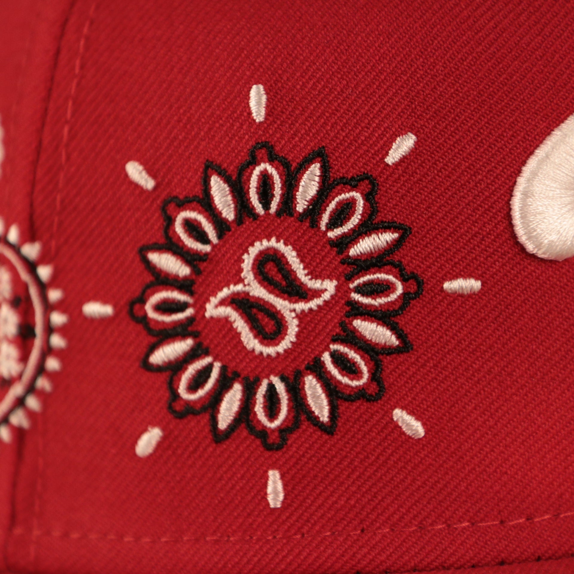 Close up of the bandana paisley pattern embroidery on the Philadelphia Phillies Paisley Elements Bandana Retro Green Bottom 59Fifty Fitted Cap