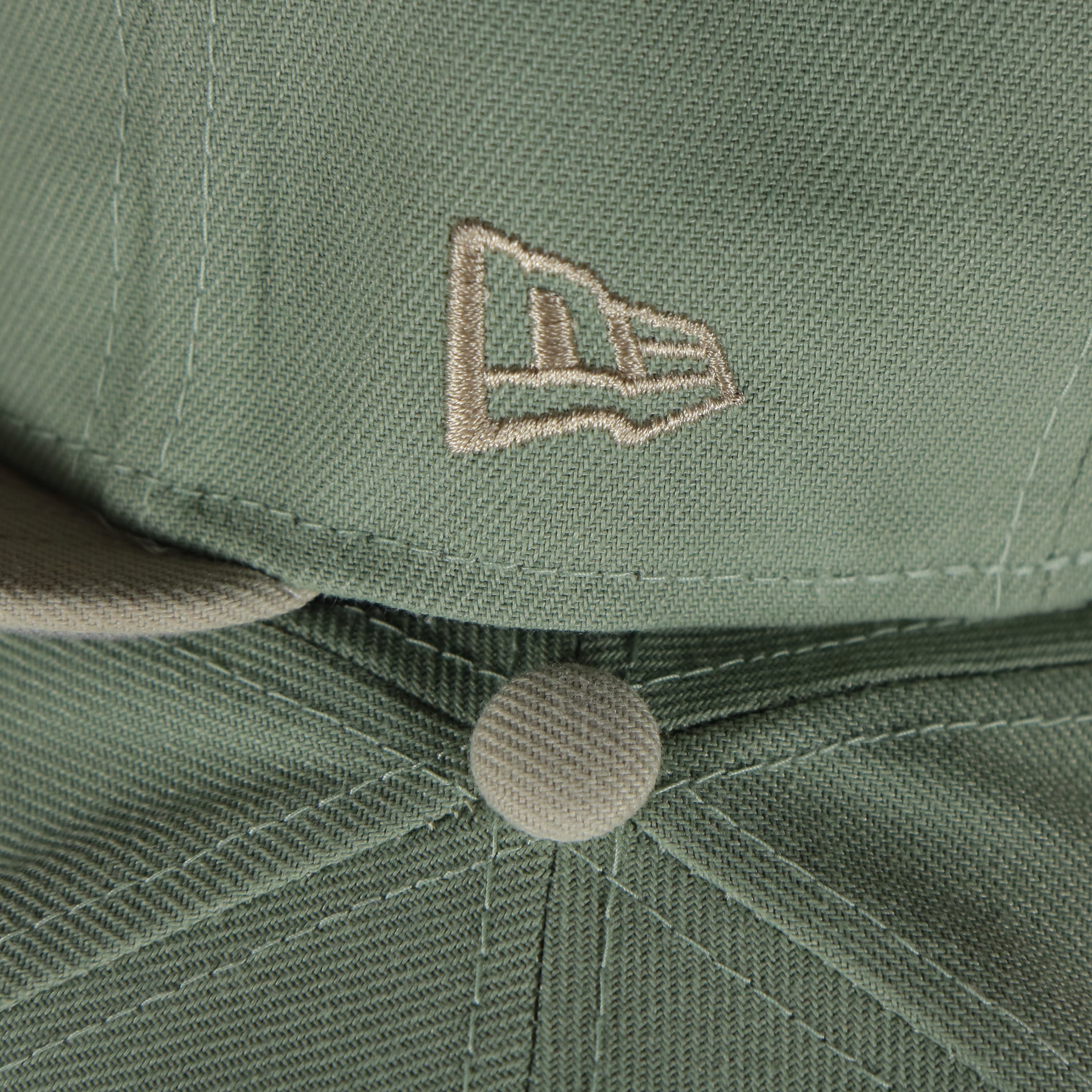 new era logo on the Memphis Chicks Hometown Roots Two Tone Grey Bottom Light Sage/Sand 59Fifty Fitted Cap