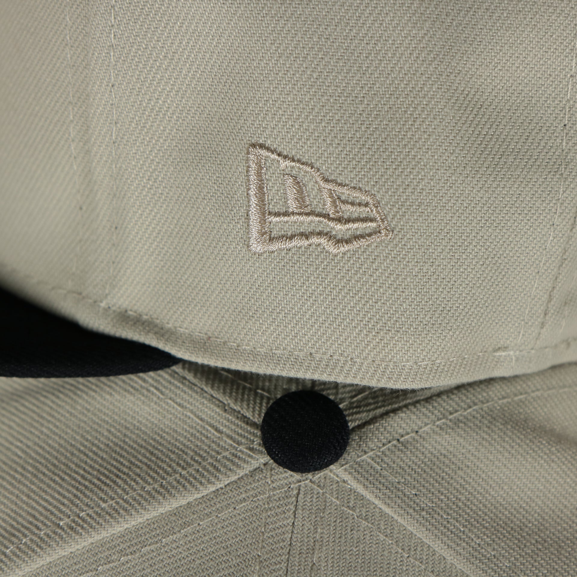 new era logo on the Boston Red Sox World Class 9-Time World Series Champions Two Tone Grey Bottom | Sand/Navy 59Fifty Fitted Cap