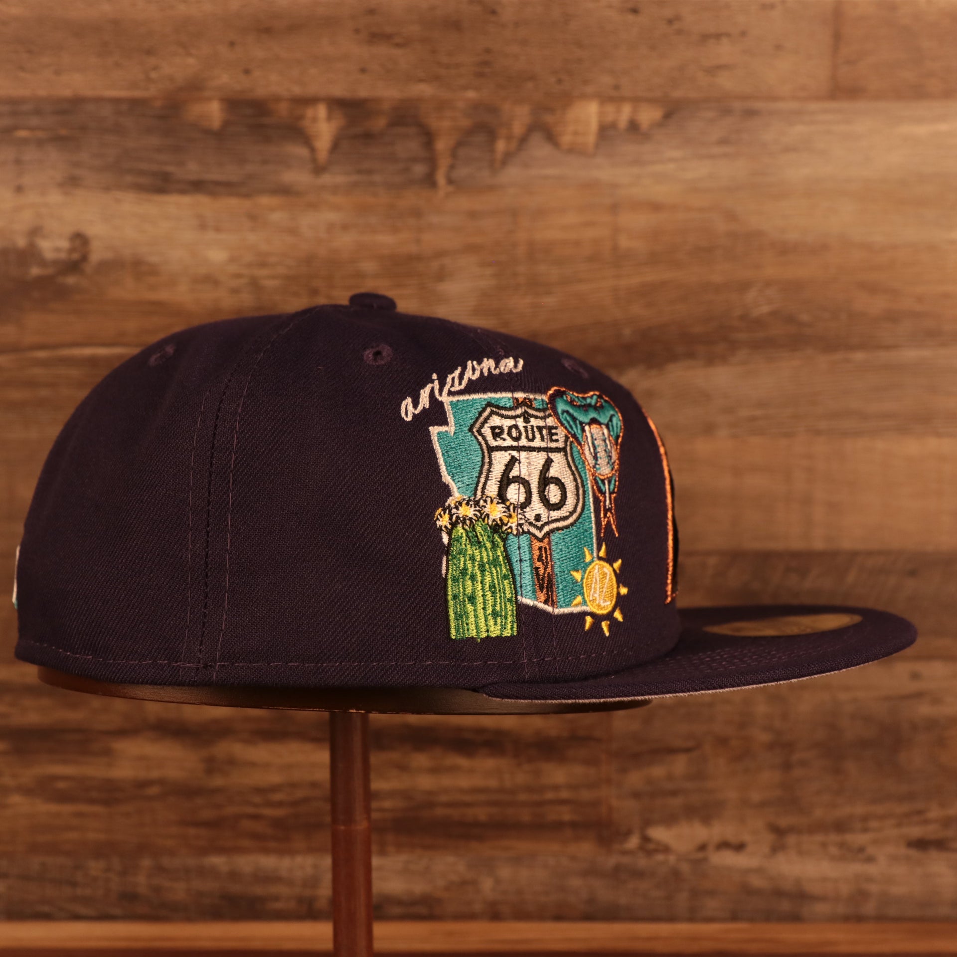 Wearer's right of the Arizona Diamondbacks "City Cluster" Side Patch Gray Bottom Purple 59Fifty Fitted Cap