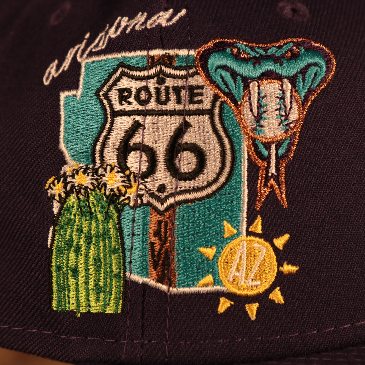 Close up side patch of the Arizona Diamondbacks "City Cluster" Side Patch Gray Bottom Purple 59Fifty Fitted Cap