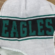 The Eagles Wordmark on the Philadelphia Eagles Logo Wrapped Around Wordmark Trapper Hat | Gray Ushanka Hat