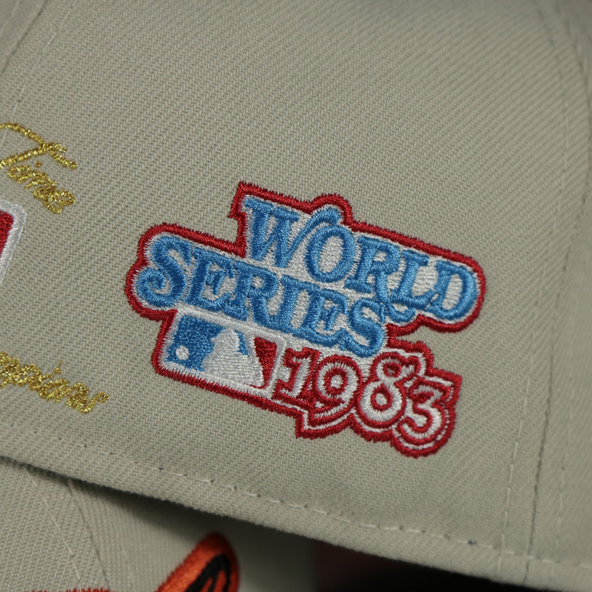 1983 world series patch on the Baltimore Orioles World Class 3-Time World Series Champions Two Tone Grey Bottom | Sand/Black 59Fifty Fitted Cap