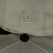 new era logo on the Baltimore Orioles World Class 3-Time World Series Champions Two Tone Grey Bottom | Sand/Black 59Fifty Fitted Cap