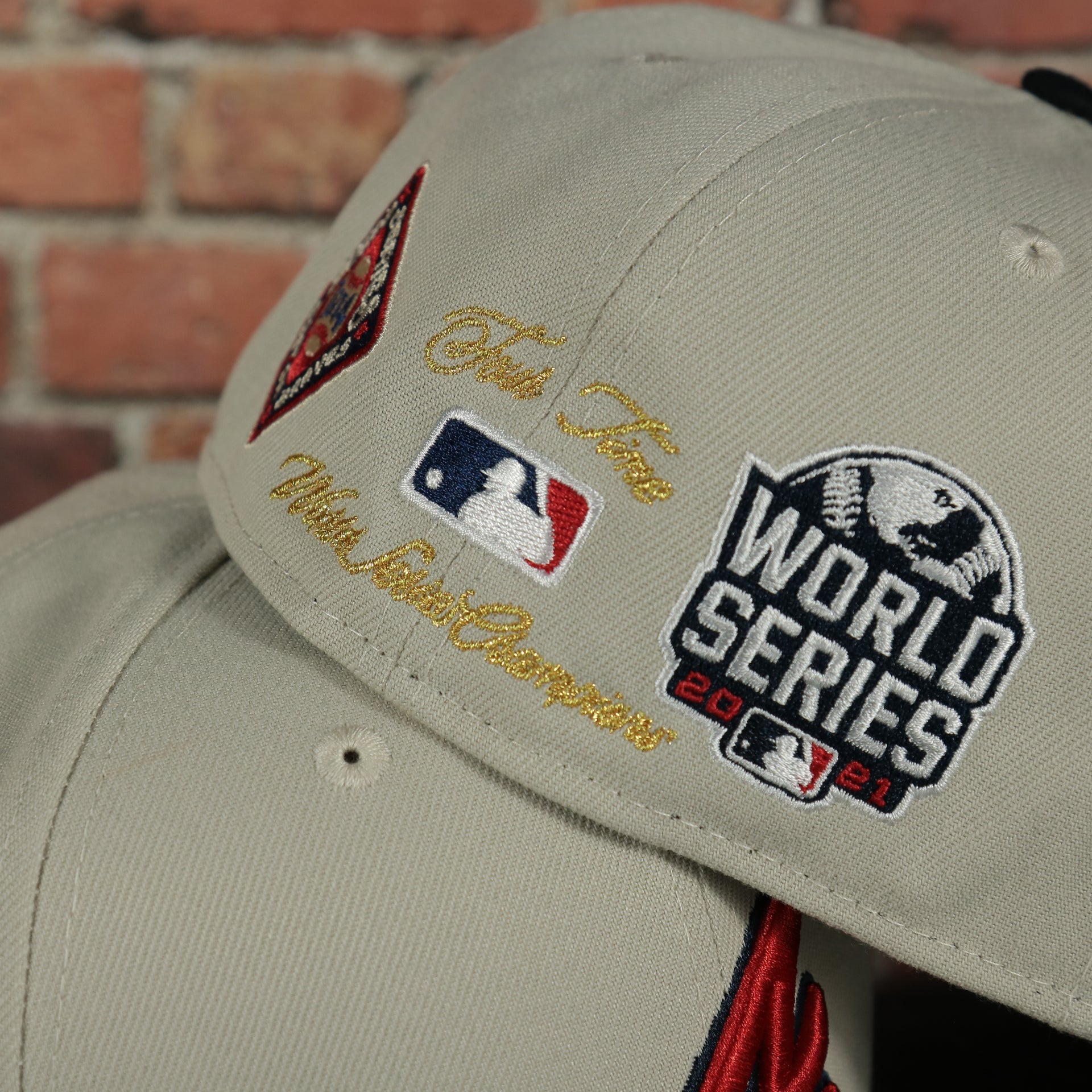 back side of the 2021 world series patch on the Atlanta Braves World Class 4-Time World Series Champions Two Tone Grey Bottom | Sand/Navy 59Fifty Fitted Cap