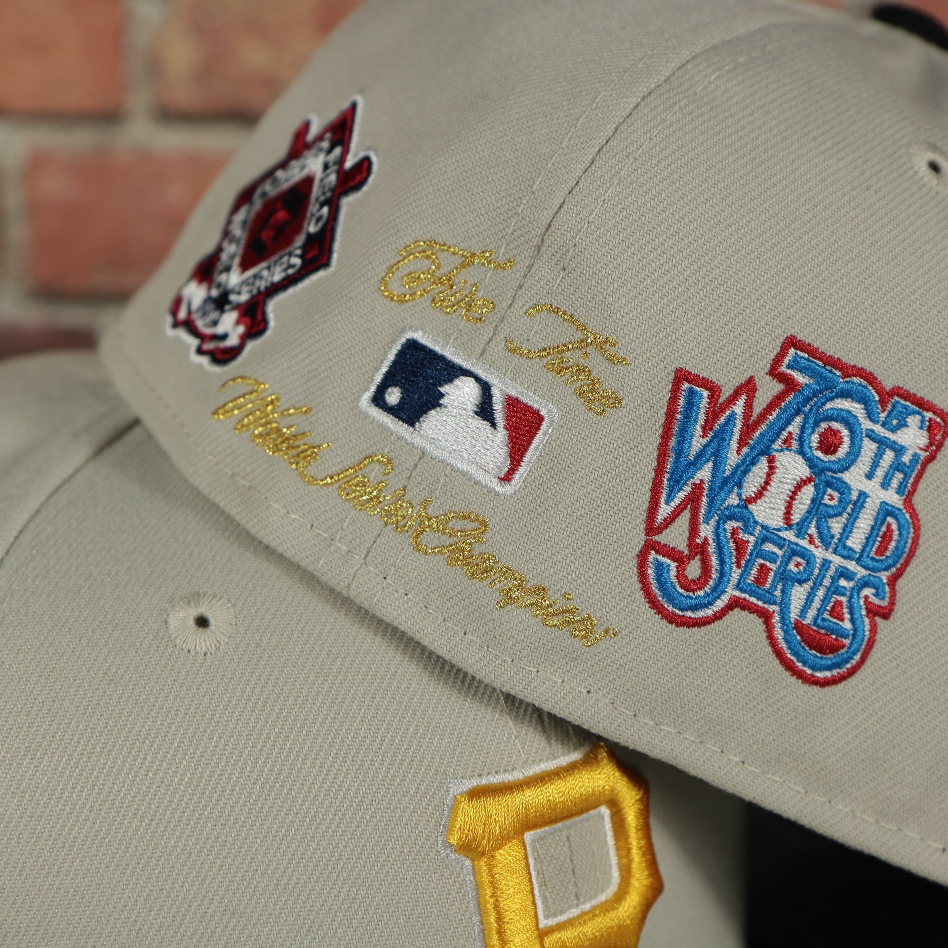 back side of the Pittsburgh Pirates World Class 5-Time World Series Champions Two Grey Bottom | Sand/Black 59Fifty Fitted Cap