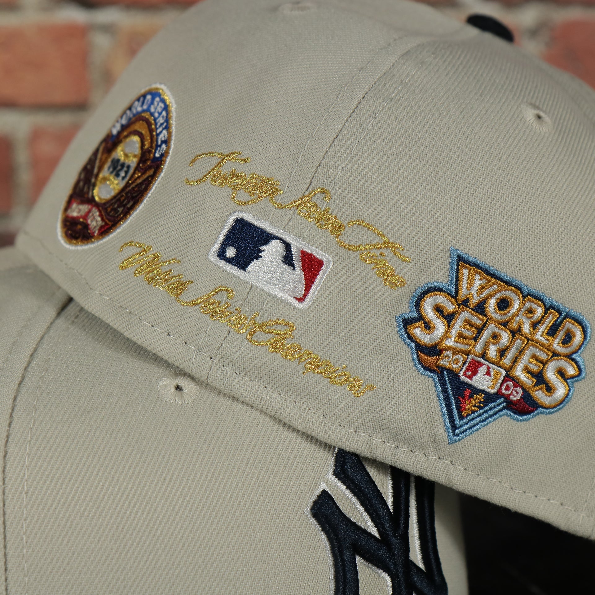 back side of the New York Yankees World Class 27-Time World Series Champions Two Tone Grey Bottom | Sand/Navy 59Fifty Fitted Cap