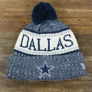 The front of the Dallas Cowboys On Field Cuffed Fisherman Knit Beanie | Navy Blue Winter Beanie