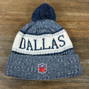 The backside of the Dallas Cowboys On Field Cuffed Fisherman Knit Beanie | Navy Blue Winter Beanie