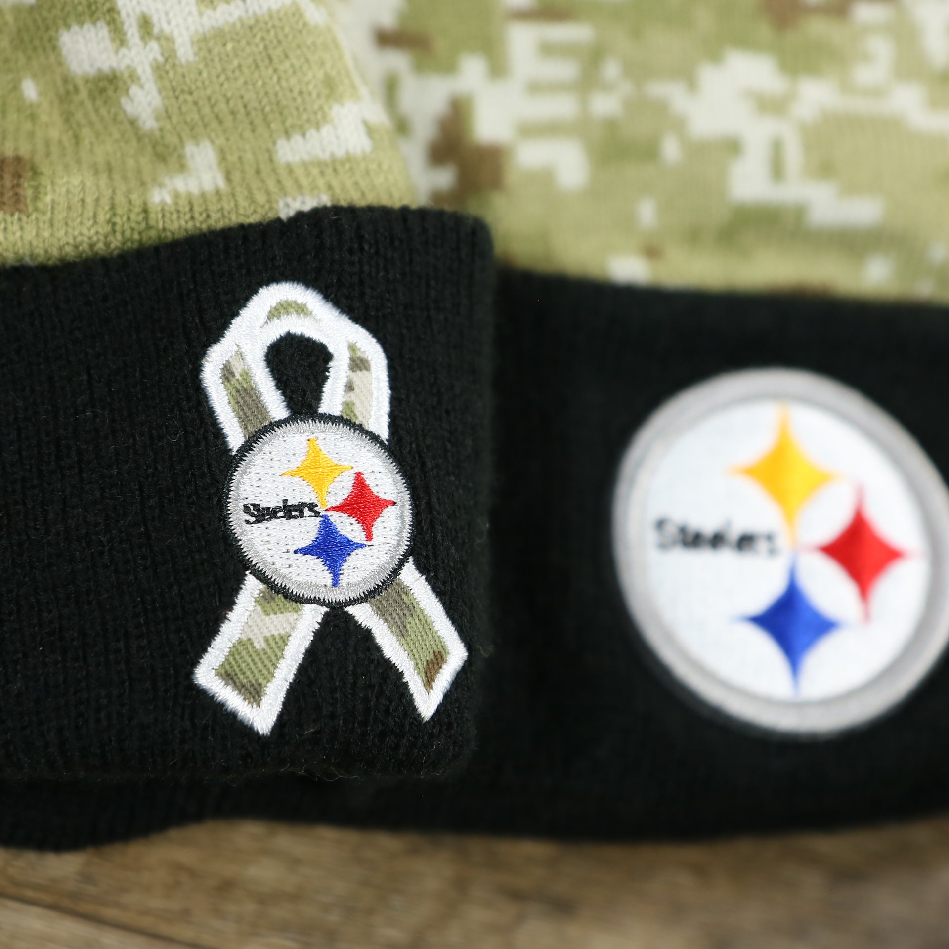 The Steelers Salute To Service Ribbon on the Pittsburgh Steelers NFL Salute To Service Cuffed Winter Beanie | Camo and Black Beanie