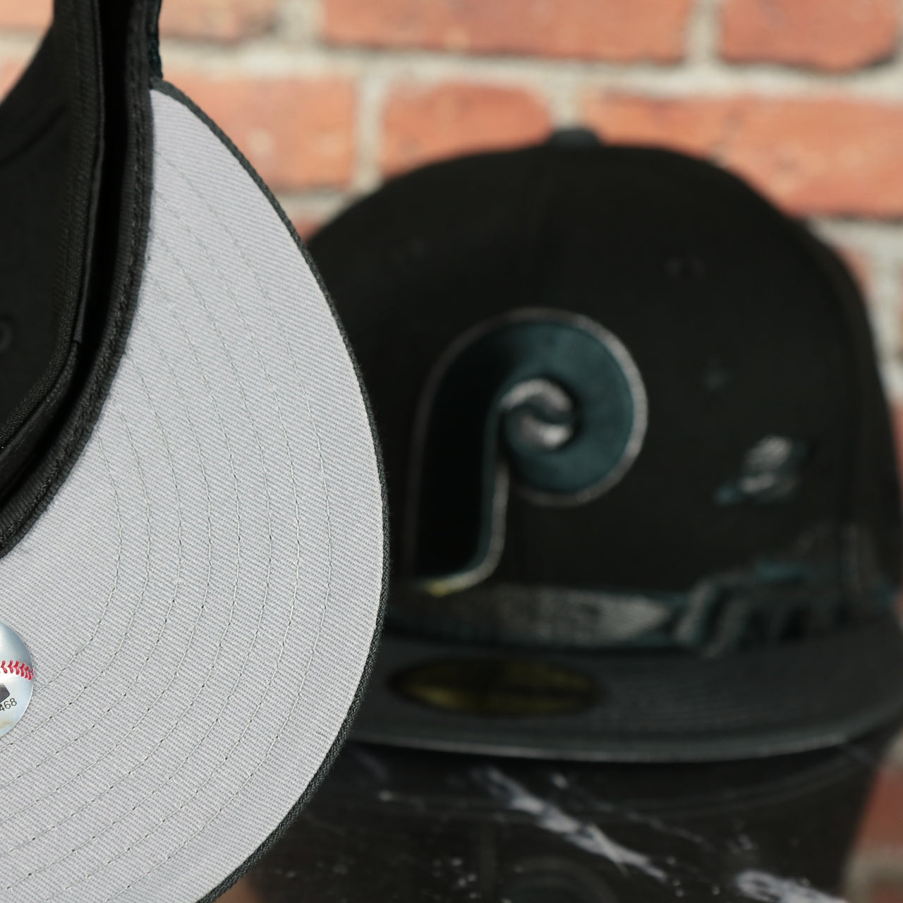 grey under visor on the Philadelphia Phillies Cooperstown Planetary Space Scenery Grey bottom | Black 59Fifty Fitted Cap