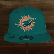 front of the Miami Dolphins "Patch Up" 1993 Pro Bowl Side Patch Gray Bottom 59Fifty Teal Fitted Cap