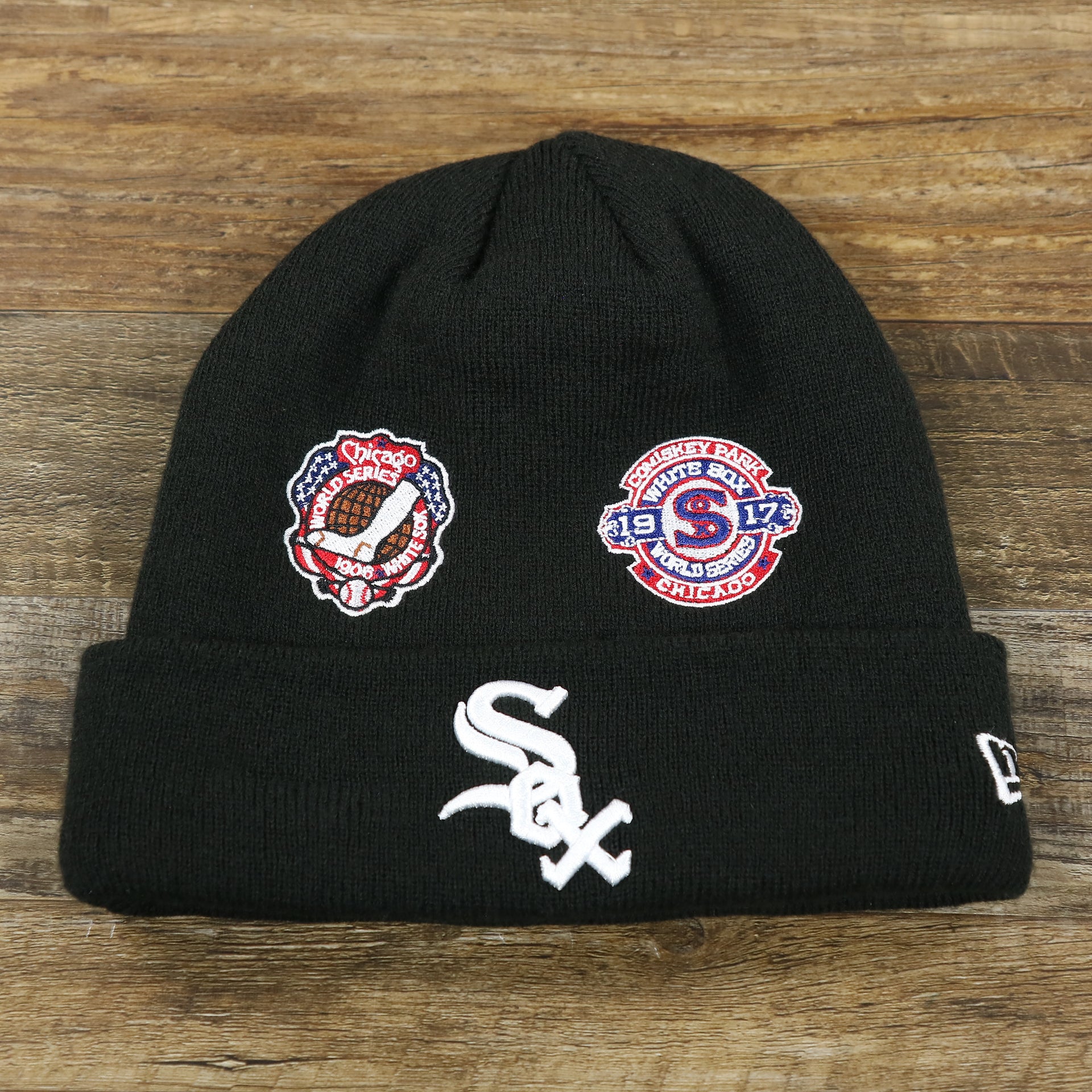 The front of the Chicago White Sox All Over World Series Side Patch 3x Champion Knit Cuff Beanie | New Era, Black