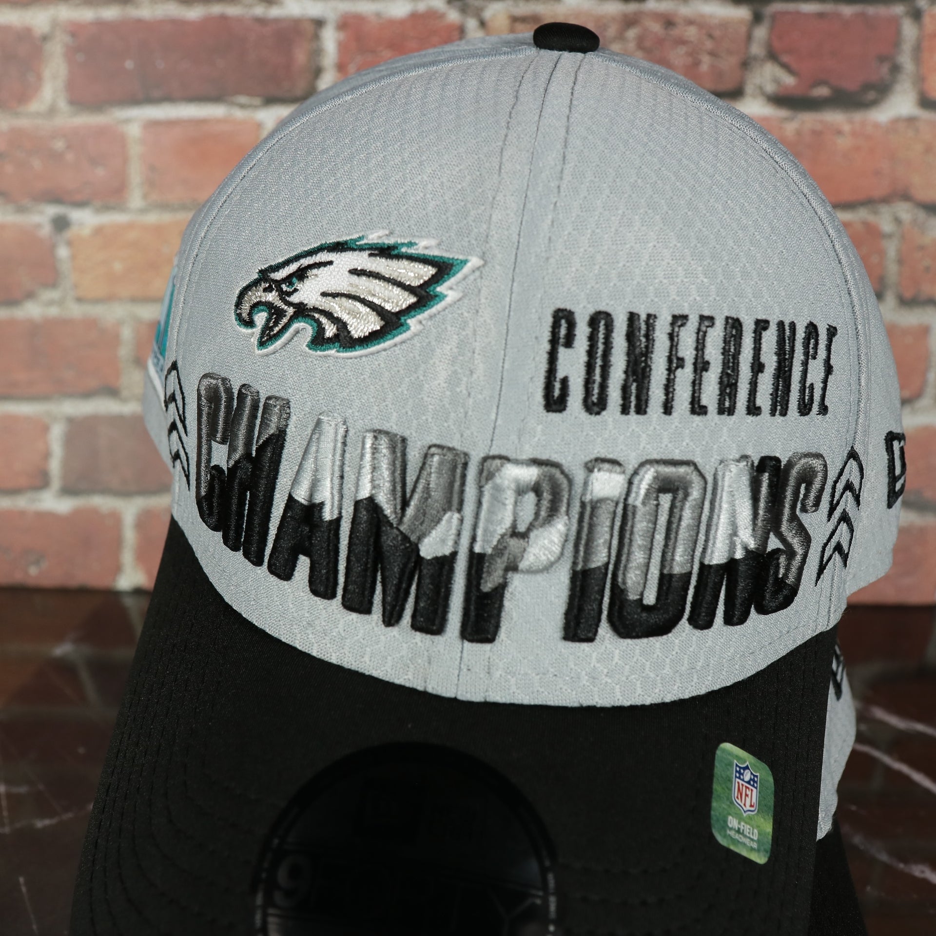 conference champion wordmark on the Philadelphia Eagles LVII Superbowl Conference Champions Two Tone Gray/Black 9Forty Dad Hat