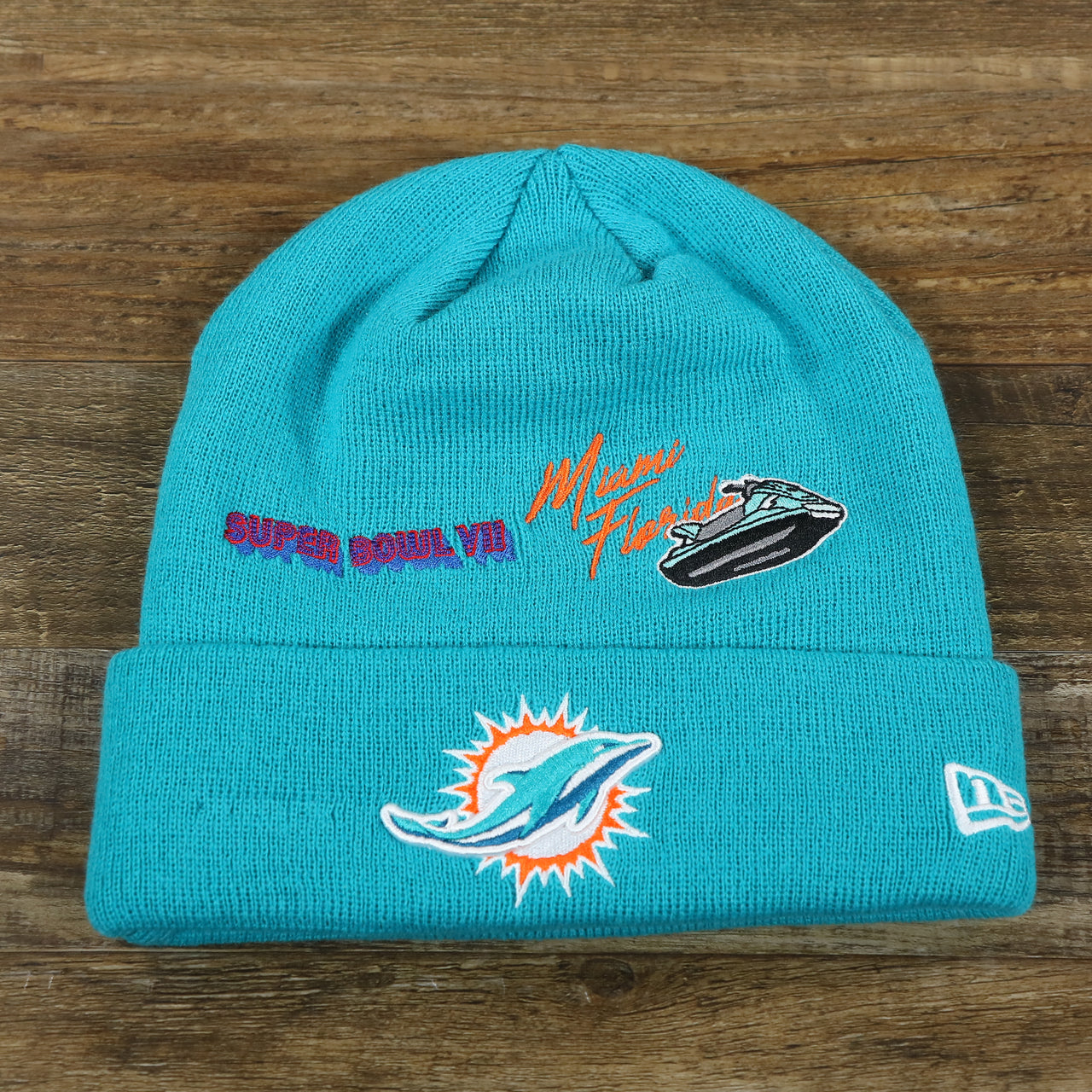 The front of the Miami Dolphins "City Transit" 59Fifty Fitted Matching All Over Side Patch Beanie