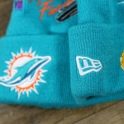 The New Era Logo on the Miami Dolphins "City Transit" 59Fifty Fitted Matching All Over Side Patch Beanie
