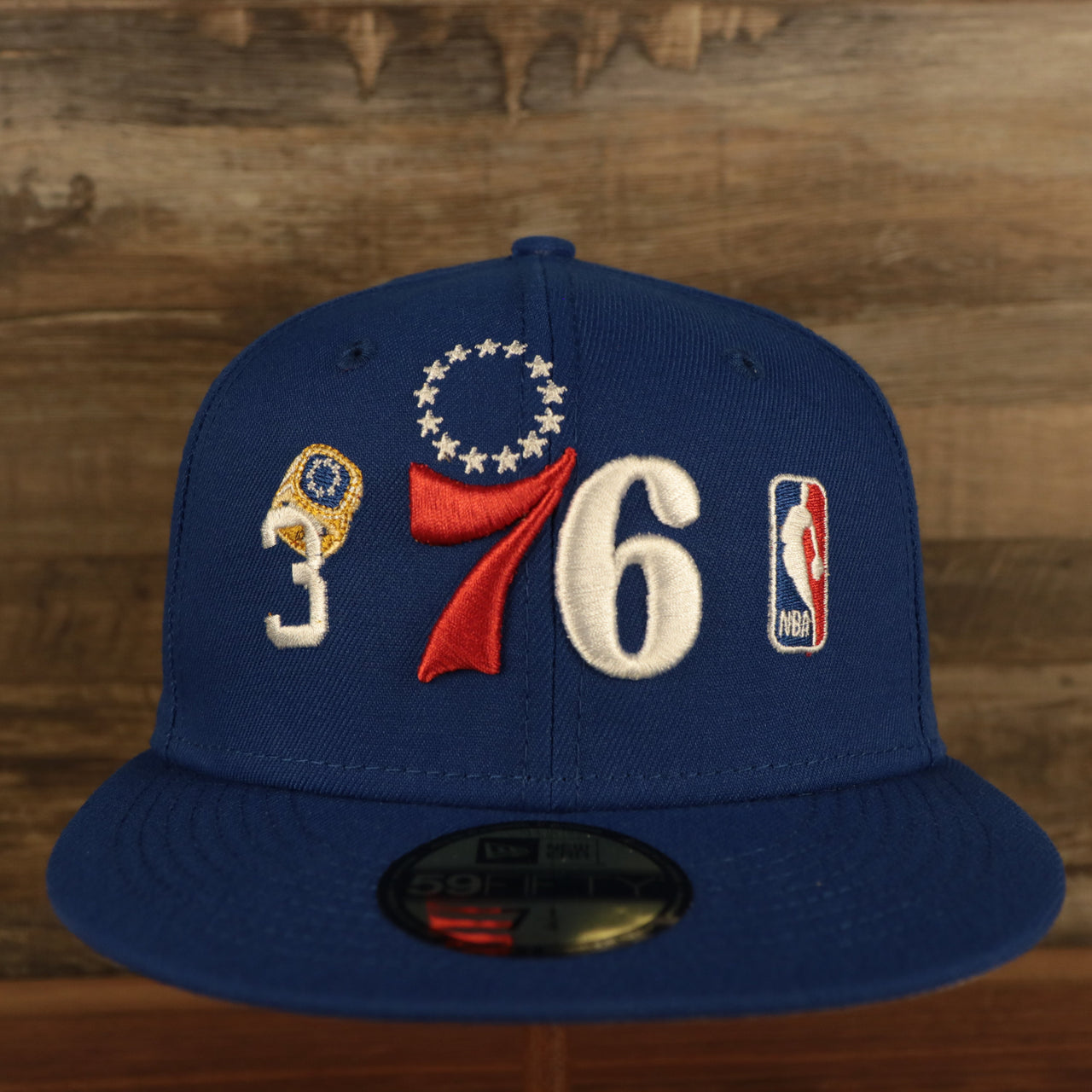 front view of Philadelphia 76ers "Championship Rings" All Over Side Patch Gray Bottom 59FIFTY Fitted Cap