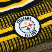 The Steelers Sideline Patch on the Pittsburgh Steelers On Field Sideline Cuffed Winter Knit Pom Pom Beanie | Yellow Winter Beanie