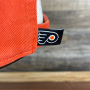 flyers tag on the back of the Philadelphia Flyers Orange Adjustable Dad Hat