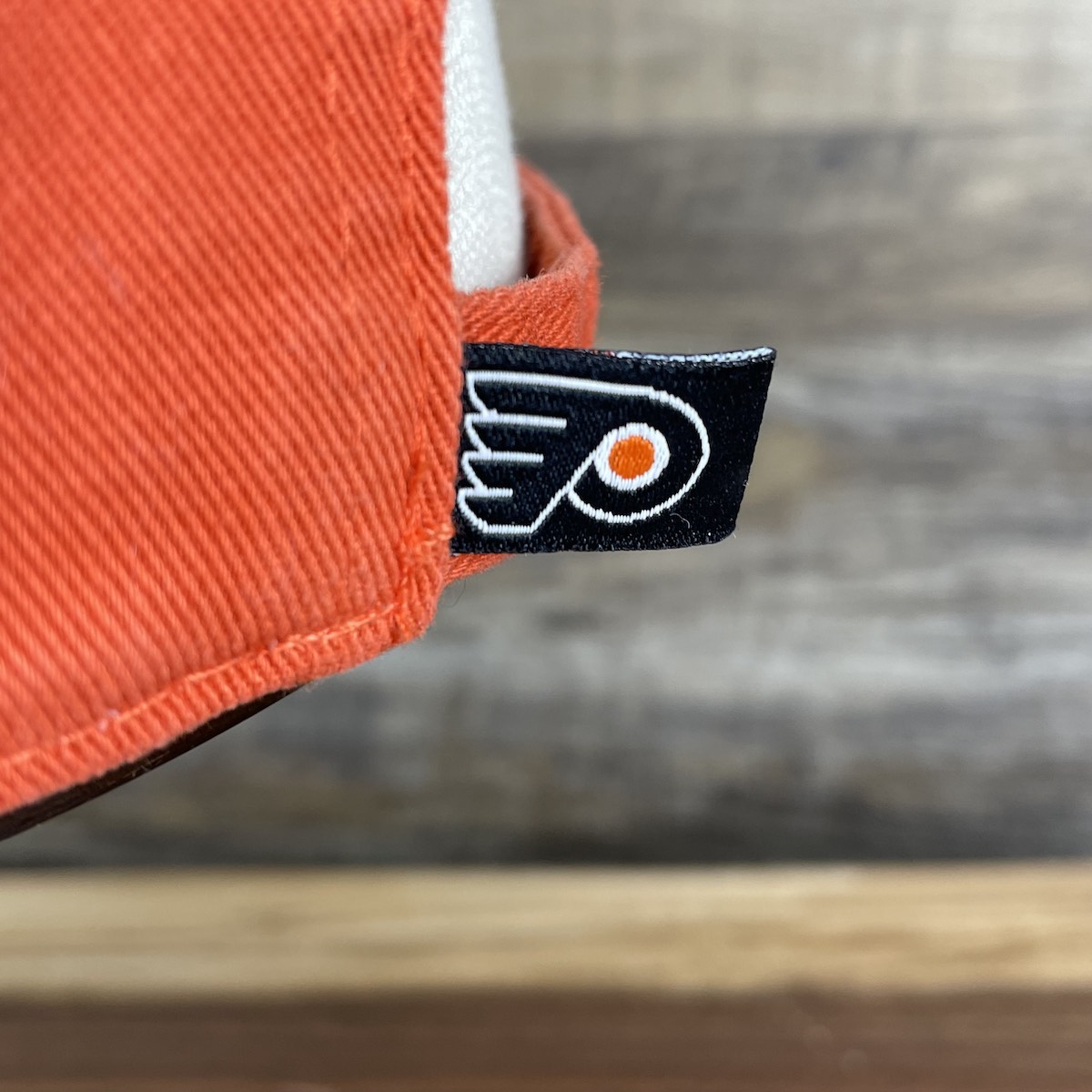 flyers tag on the back of the Philadelphia Flyers Orange Adjustable Dad Hat