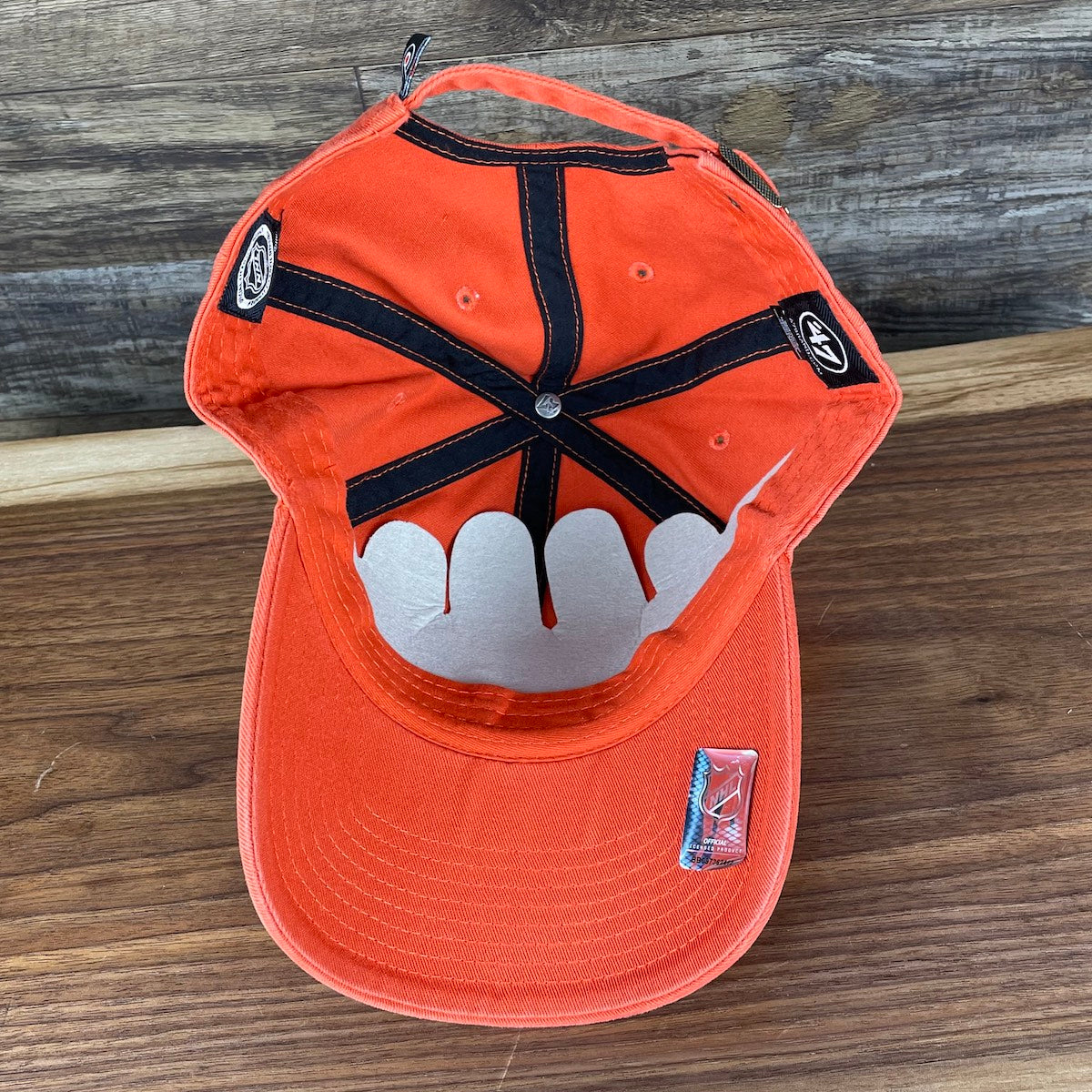 underside of the Philadelphia Flyers Orange Adjustable Dad Hat