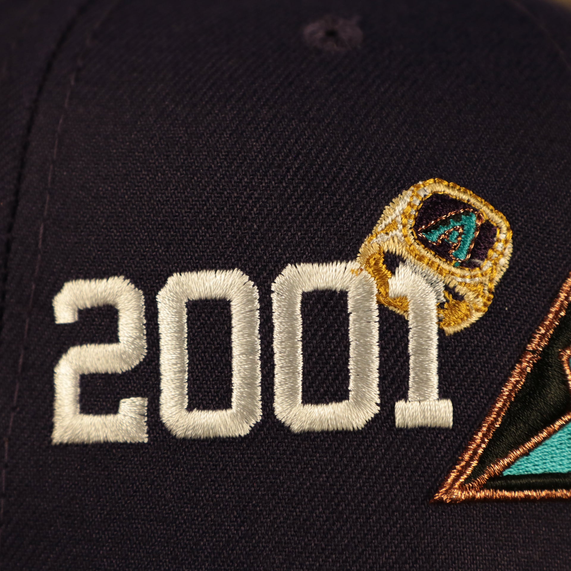 2001 logo on the Arizona Diamondbacks Cooperstown "Championship Rings" All Over Side Patch Gray Bottom 59FIFTY Fitted Cap