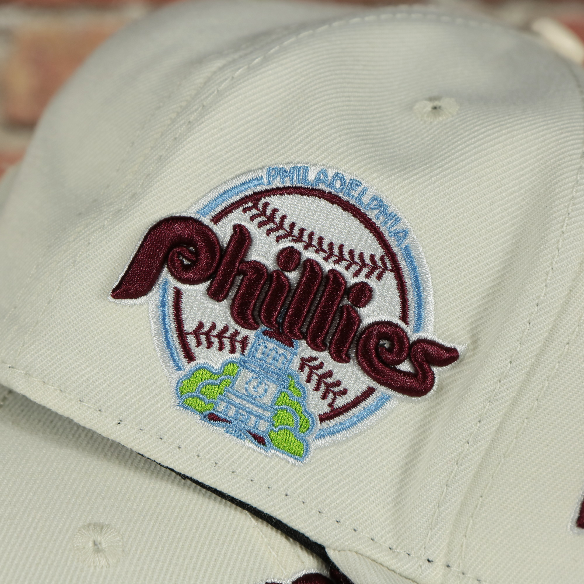 1984 phillies logo on the Philadelphia Phillies Cooperstown 1970 "Phillies" Script 1984 Phillies logo side patch Cream Snapback Hat