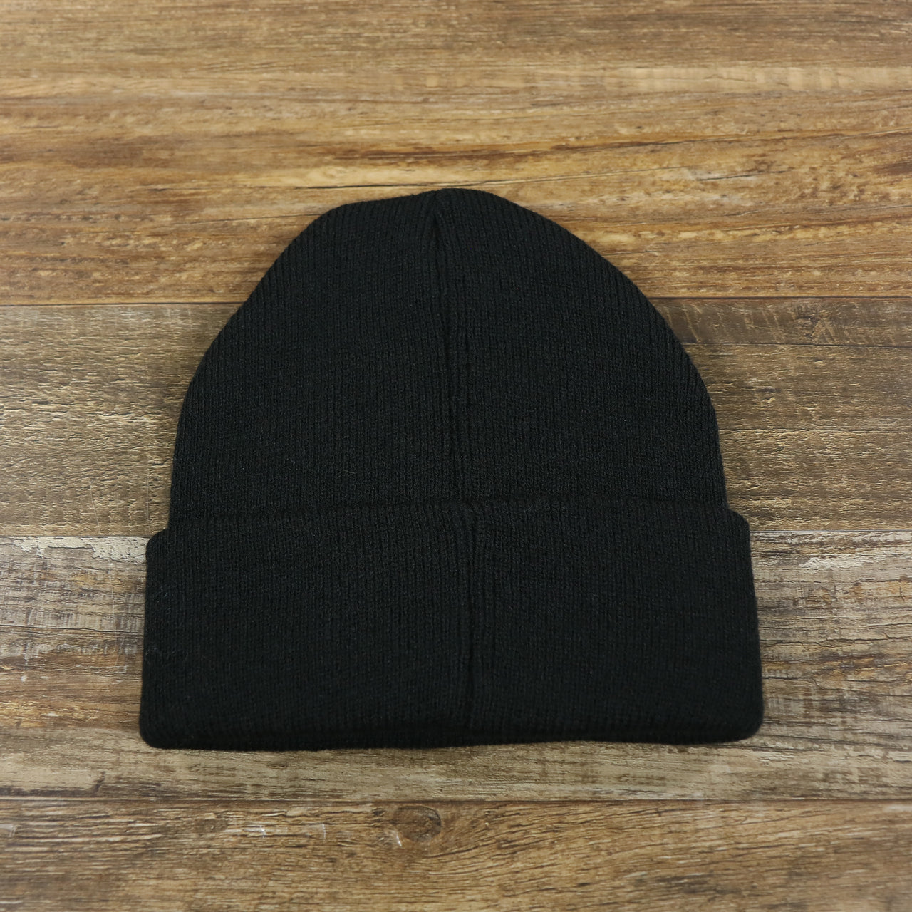The backside of the Kid’s New Jersey Devils Basic Cuffed Winter Beanie | Black Winter Beanie