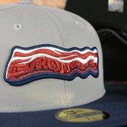 ironpigs bacon logo on the Lehigh Valley Ironpigs On Field Plain Jane 2014 Ironpigs Bacon Logo MiLB Black Bottom 2 Tone | Navy/Grey 59Fifty Fitted Cap