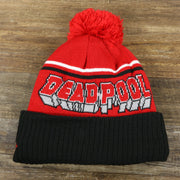 The backside of the DC Comics Deadpool Mask Logo Deadpool Wordmark Striped Beanie With Red Pom Pom | Red And Black Winter Beanie