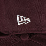 new era logo on the Lehigh Valley Ironpigs On Field Plain Jane 2014 Ironpigs Liberty Bell Logo MiLB Black Bottom | Maroon 59Fifty Fitted Cap