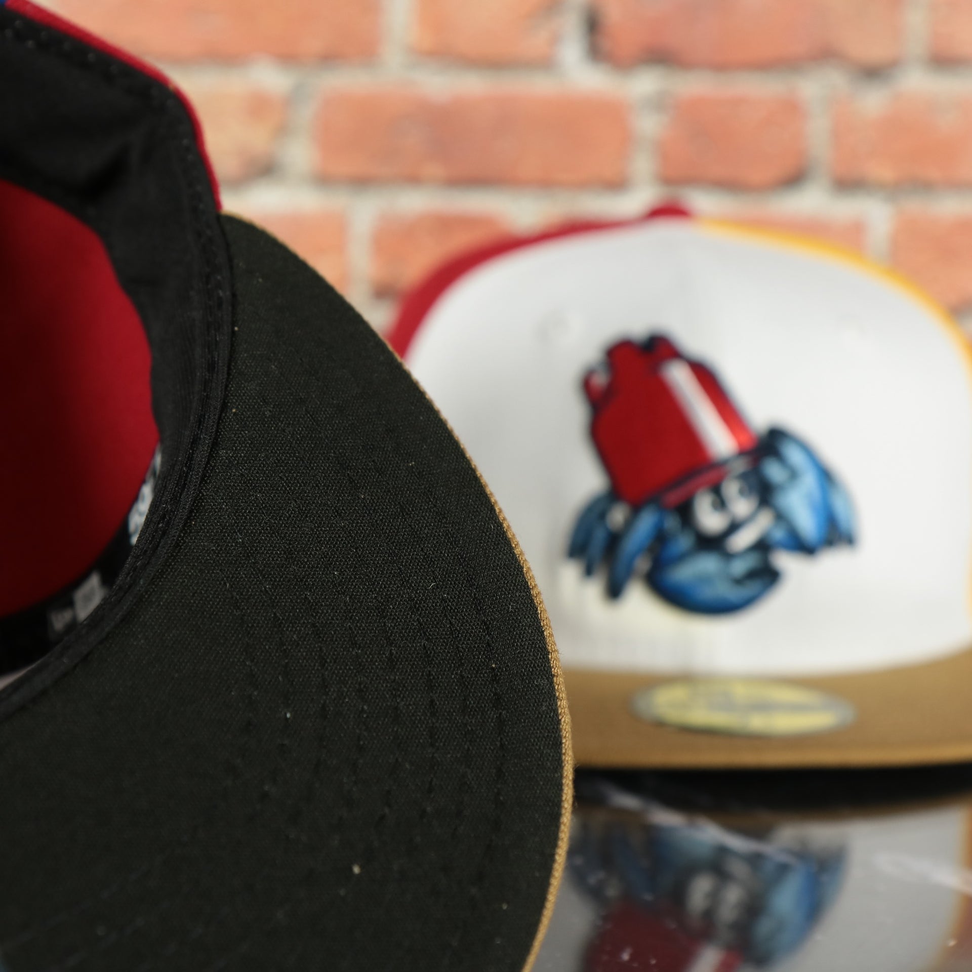 black under visor on the Jersey Shore On Field Plain Jane Blueclaws Bucket Blueclaw  MiLB Black bottom 4 Tone | White/Red/Tan/Royal 59Fifty Fitted Cap