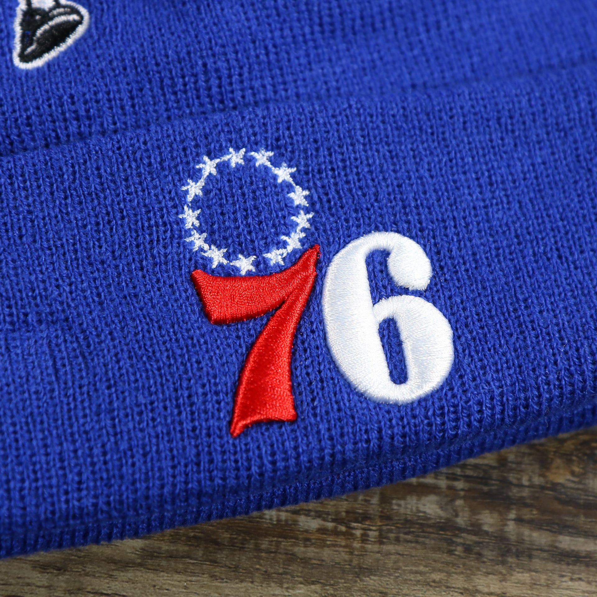 The 76ers Logo on the Philadelphia 76ers "City Transit" 59Fifty Fitted Matching All Over Side Patch Beanie