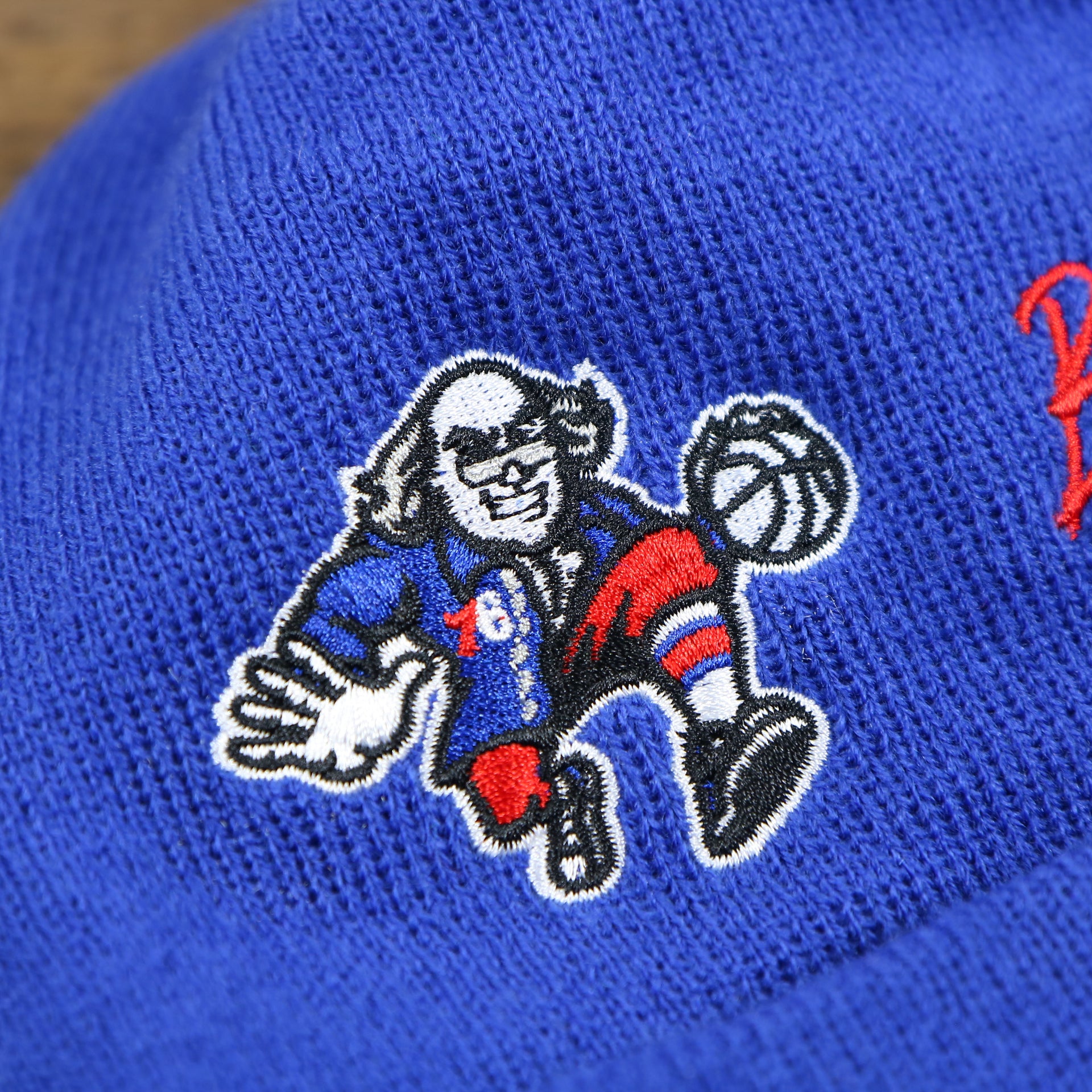 The retro 76ers Logo on the Philadelphia 76ers "City Transit" 59Fifty Fitted Matching All Over Side Patch Beanie