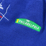 The 100 Philadelphia Street Sign on the Philadelphia 76ers "City Transit" 59Fifty Fitted Matching All Over Side Patch Beanie