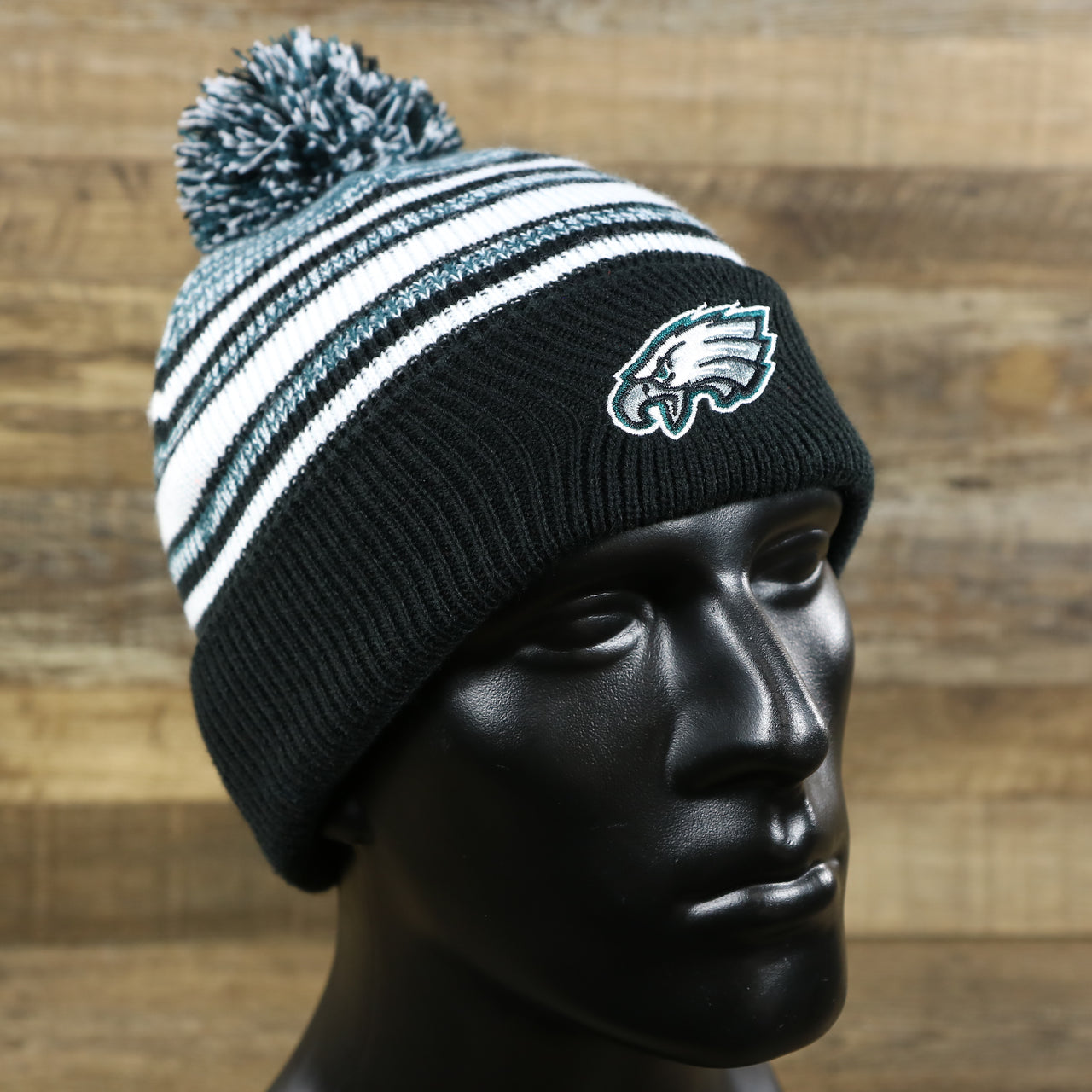 The Kid’s Philadelphia Eagles Striped Pom Pom Winter Beanie | Black, Midnight Green, And White Beanie