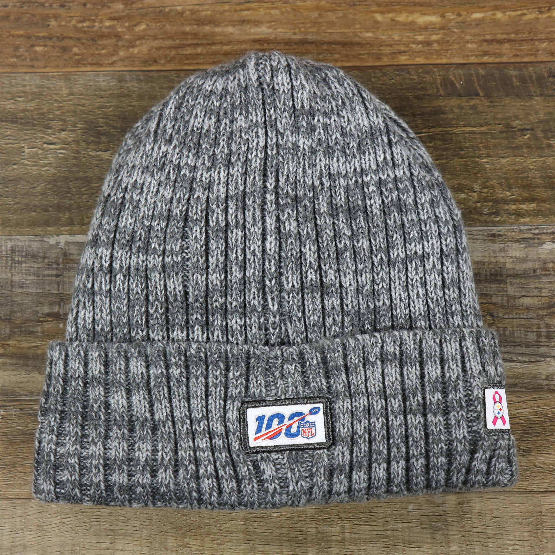 The backside of the Pittsburgh Steelers On Field Crucial Catch Winter Knit Graphite Beanie | Gray Winter Beanie