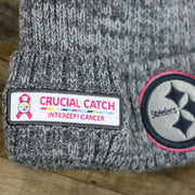 The Crucial Catch Patch on the Pittsburgh Steelers On Field Crucial Catch Winter Knit Graphite Beanie | Gray Winter Beanie