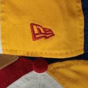 new era logo on the Jersey Shore Blueclaws Bucket Blueclaw MiLB Tan bottom 4 Tone | White/Red/Tan/Royal 9Twenty Child Dad Hat
