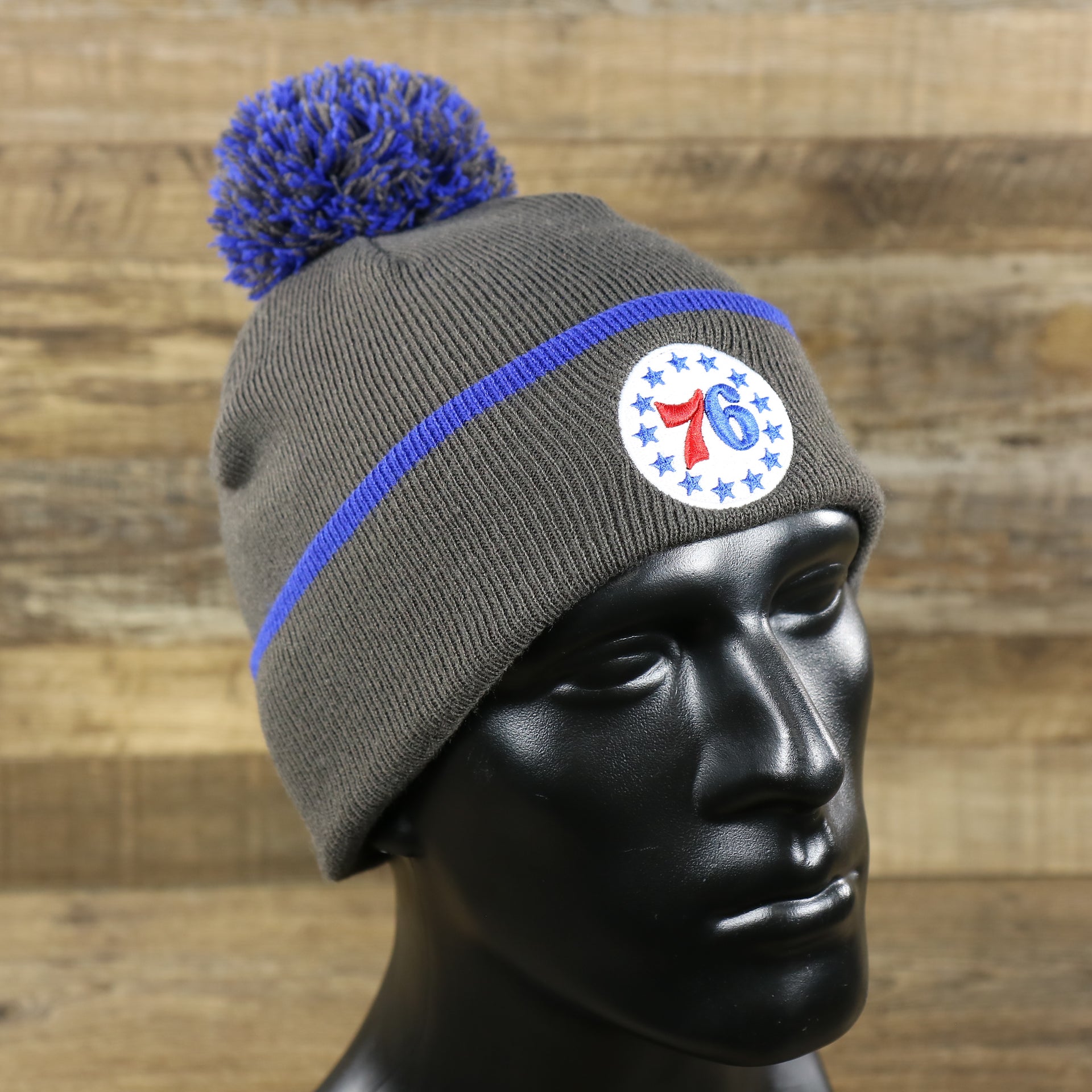 The Philadelphia 76ers Cuffed Logo Baraka Knit Charcoal Winter Beanie | Gray And Royal Blue Beanie