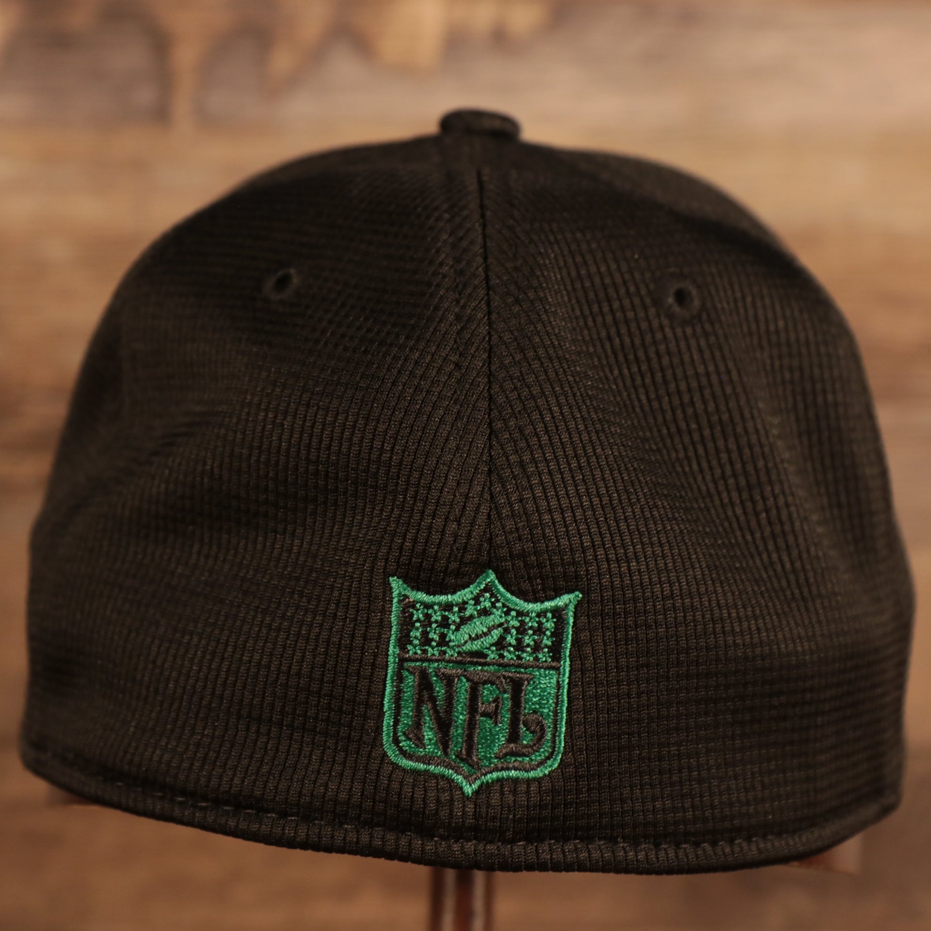Back of the Philadelphia Eagles 2021 Sideline On-Field Throwback Logo 39Thirty Stretch Cap