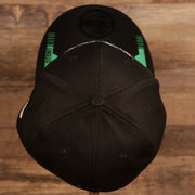 Top down view of the Philadelphia Eagles 2021 Sideline On-Field Throwback Logo 39Thirty Stretch Cap